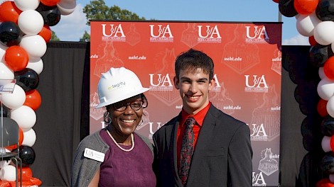 Dr. Christine Holt and Ethan Miller