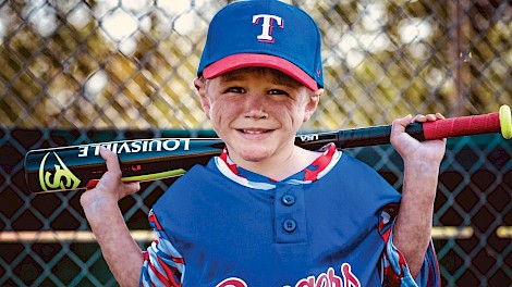 In 2018, five-year-old Austin took to the field, playing T-ball for the Rangers.