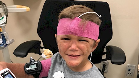 At the age of four, Austin participated in a pulmonary function test conducted by the National Institute of Health.