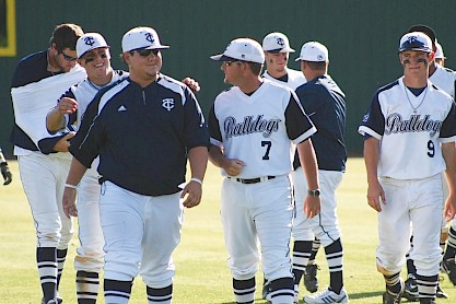 Texarkana College Head Coach Will Bolt and Chase Brewster celebrate their 2010 conference championship victory. Photo by Lauren Bolt