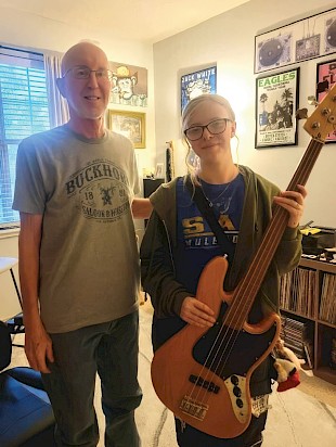Maylee Waddill, a student of Grissom, was gifted his favorite bass guitar, a gesture that reflects his commitment to supporting young musicians.