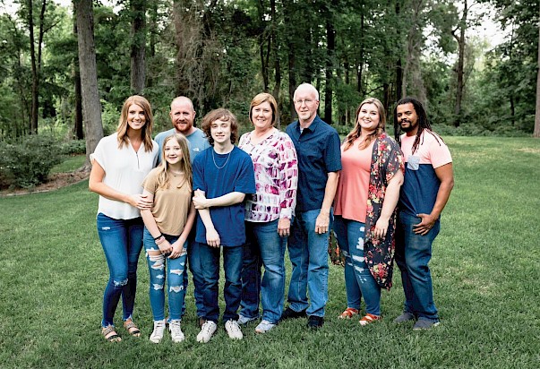 Grissom’s family gathered for a photo on Mother’s Day 2022. (l-R) Jenna Blue, Addie Blue,  Matt Blue, Trenton Blue, Kathy Grissom, Ed Grissom, Jessica Grissom, and Robert Beasley. 