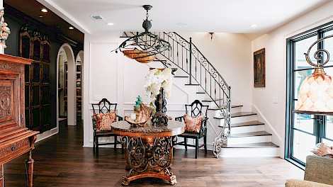 The staircase was relocated and framed with custom railing by Jerome LeGrand.The staircase was relocated and framed with custom railing by Jerome LeGrand.