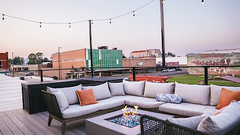 The rooftop deck and wet bar offer views of the entertainment district.