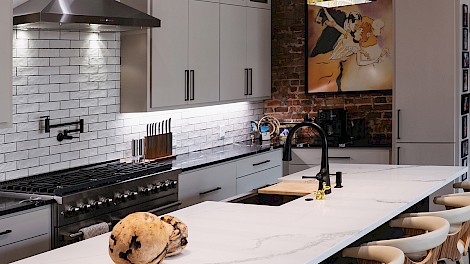 The lights over the kitchen island were handmade to order in Israel by Shimale Peleg.