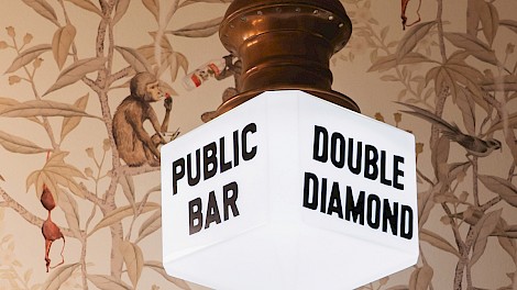 The antique light fixture in the half bath belonged to Dodson’s father and hung in his home bar for decades.