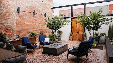In Dodson’s favorite spot, the courtyard, the archways once opened to neighboring buildings.
