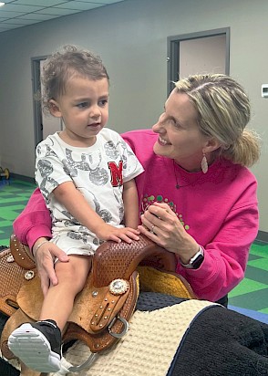 Wylie working with his therapist, Laurie Dunlap at Temple Memorial. Photo courtesy of India Thompson