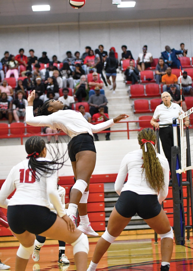 As a middle hitter and blocker, Addison rises at the net for a hit during a 2025 game. Photo by Kevin Sutton, TXKsports.com
