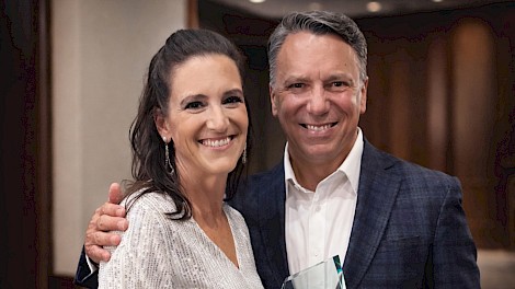 Pamela Wyatt accepts the “Excellence in Midwifery Leadership” award with OB Hospitalist Group CEO Lenny Castiglione.