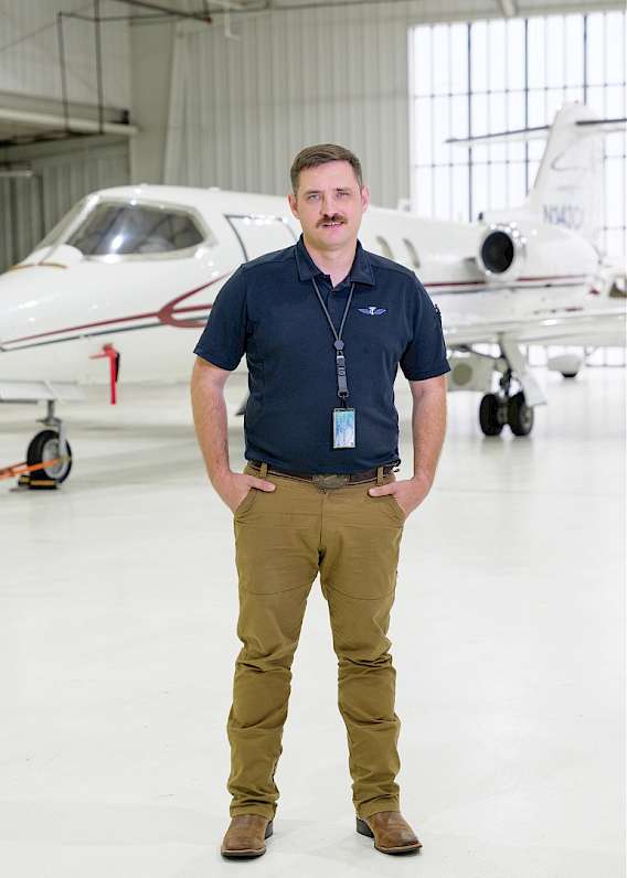 Brandon Sanders, Director of Aviation at Texarkana College, stands inside the TC aviation hangar, home to the college’s growing aviation program. photos by Matt Cornelius