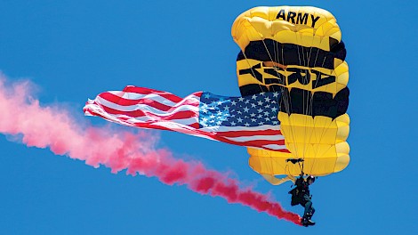 Members of the U.S. Army Golden Knights will perform patriotic parachute demonstrations during the Texarkana Airshow, including precision jumps carrying the American flag.